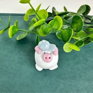 Vintage Mini Pig Figurine wearing baseball hat